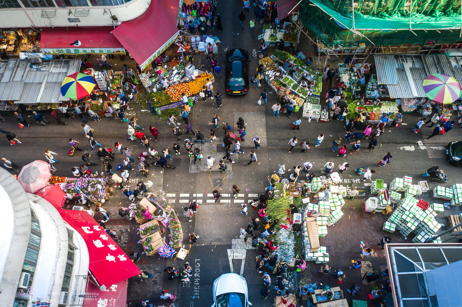 Aerial view of people in a traditional asian street market.