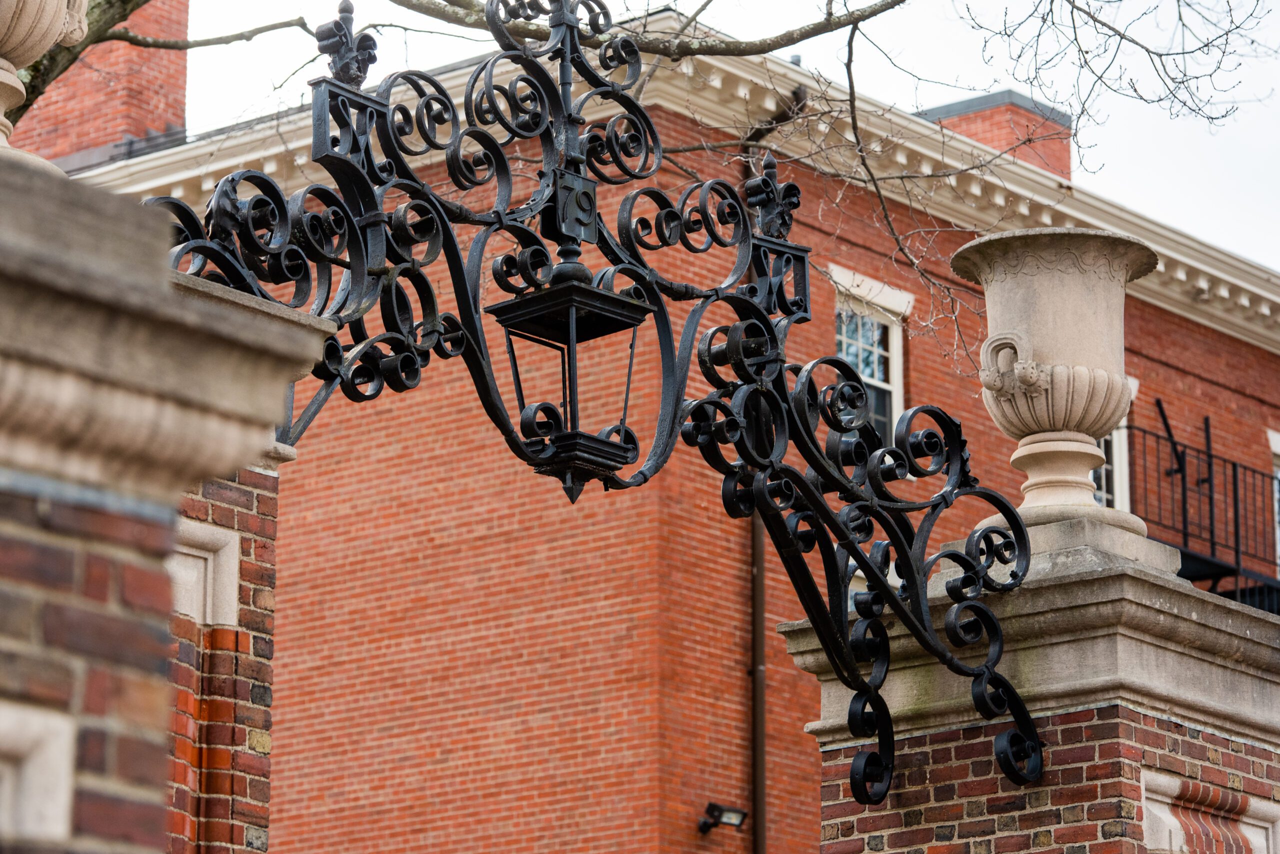 Mid view of the ornate gate in the Harvard Campus