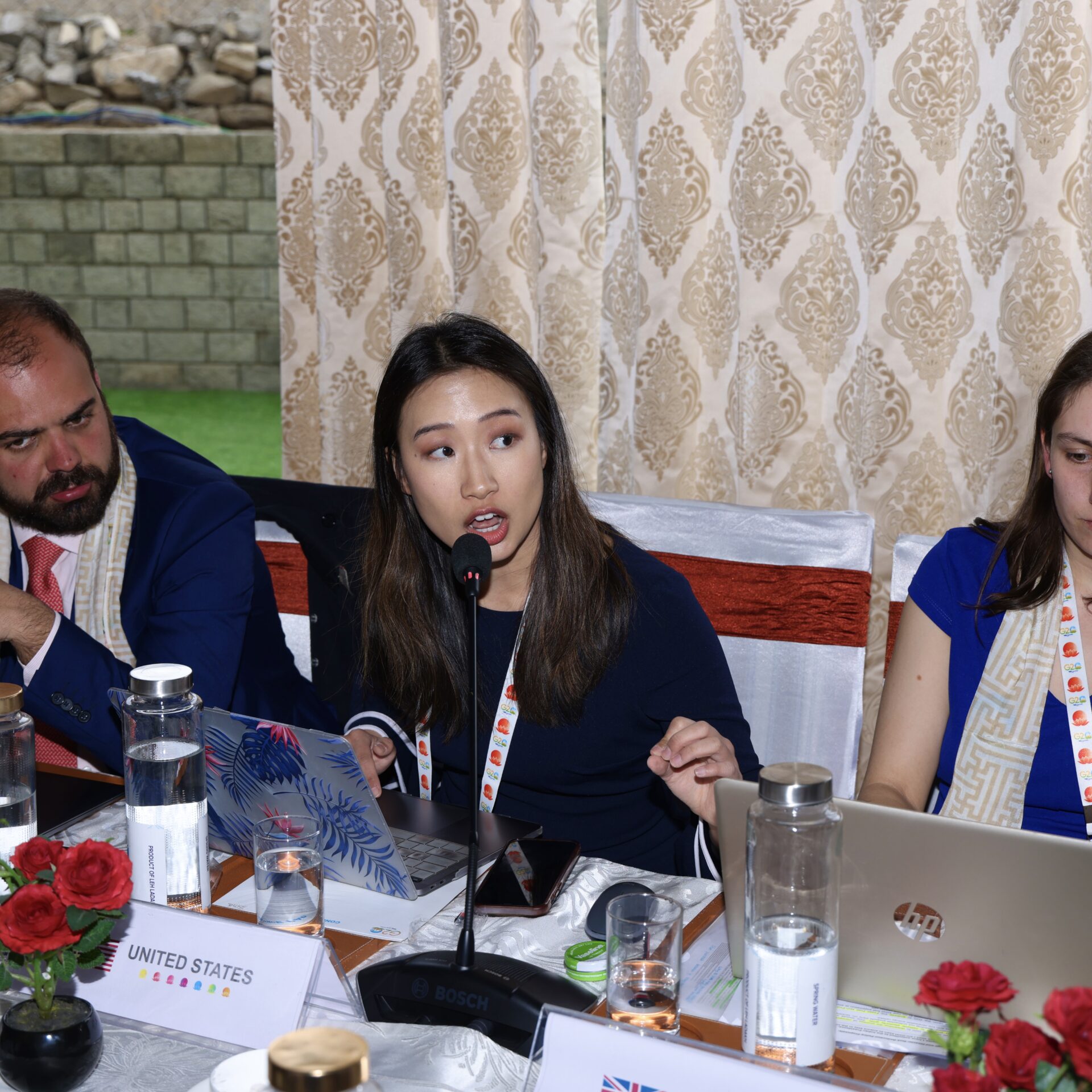 Cynthia Yue (center) participates in climate policy negotiations as part of the 2023 G20 Youth 20 Summit.