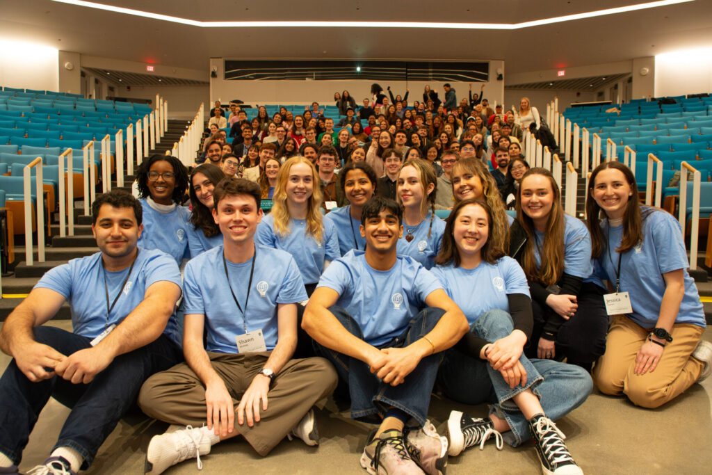 food 4 thought student organizer-leaders and volunteers sit for a photo