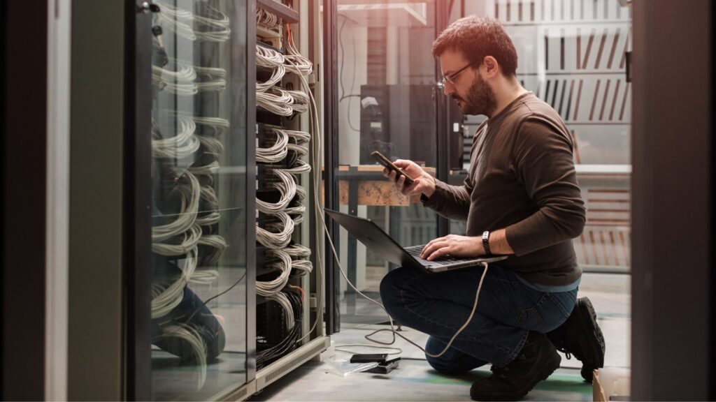 man with computer servers