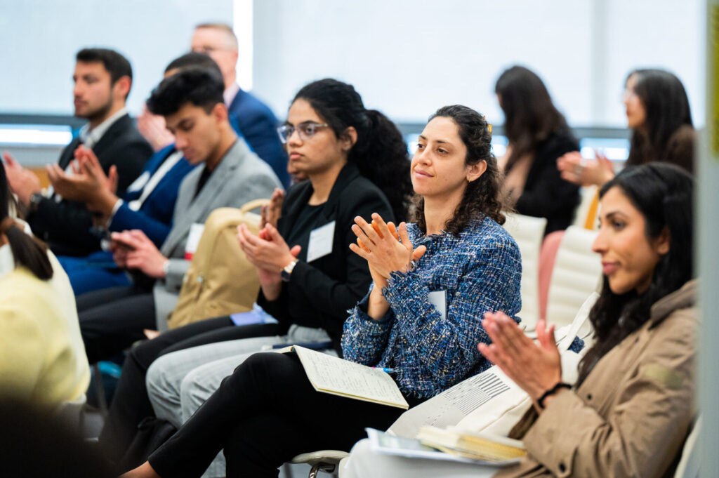 audience members applauding