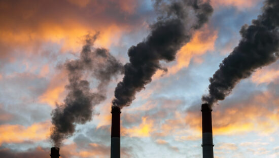Smokestacks at sunset