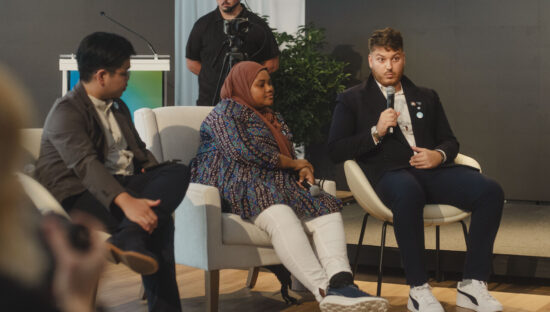 Max (with microphone) speaks during a panel at the UN General Assembly in New York. (courtesy photo)
