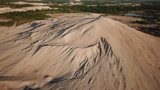 Tailings in Picher, Oklahoma, part of the Tar Creek Superfund Site (Adobe)