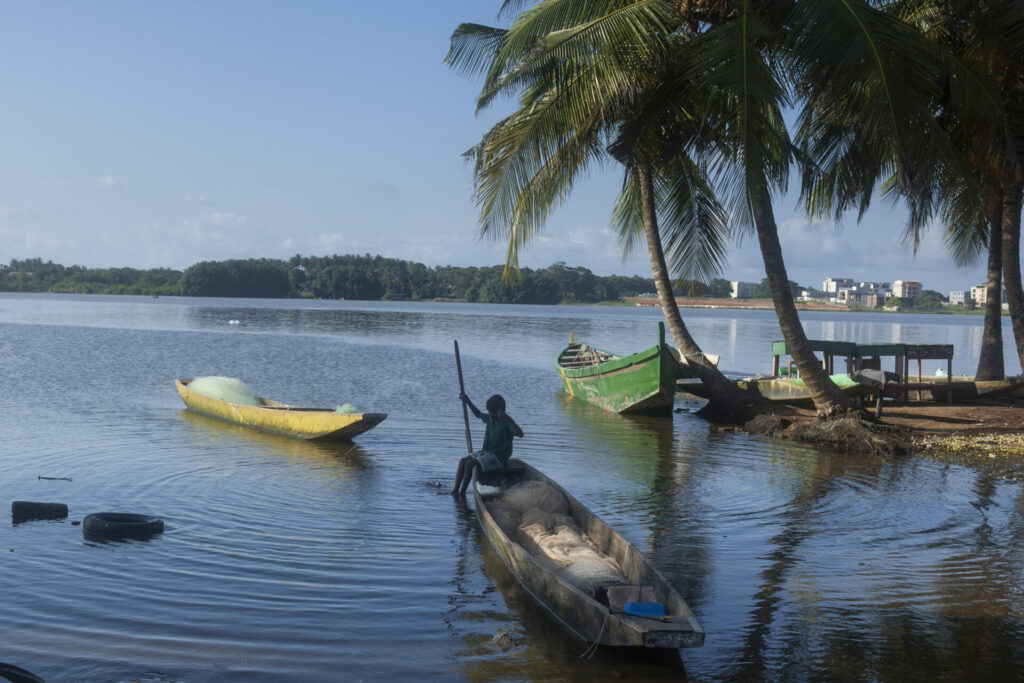 boy on a boat in Ivory Coast