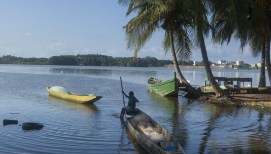 boy on a boat in Ivory Coast