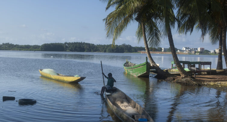 boy on a boat in Ivory Coast
