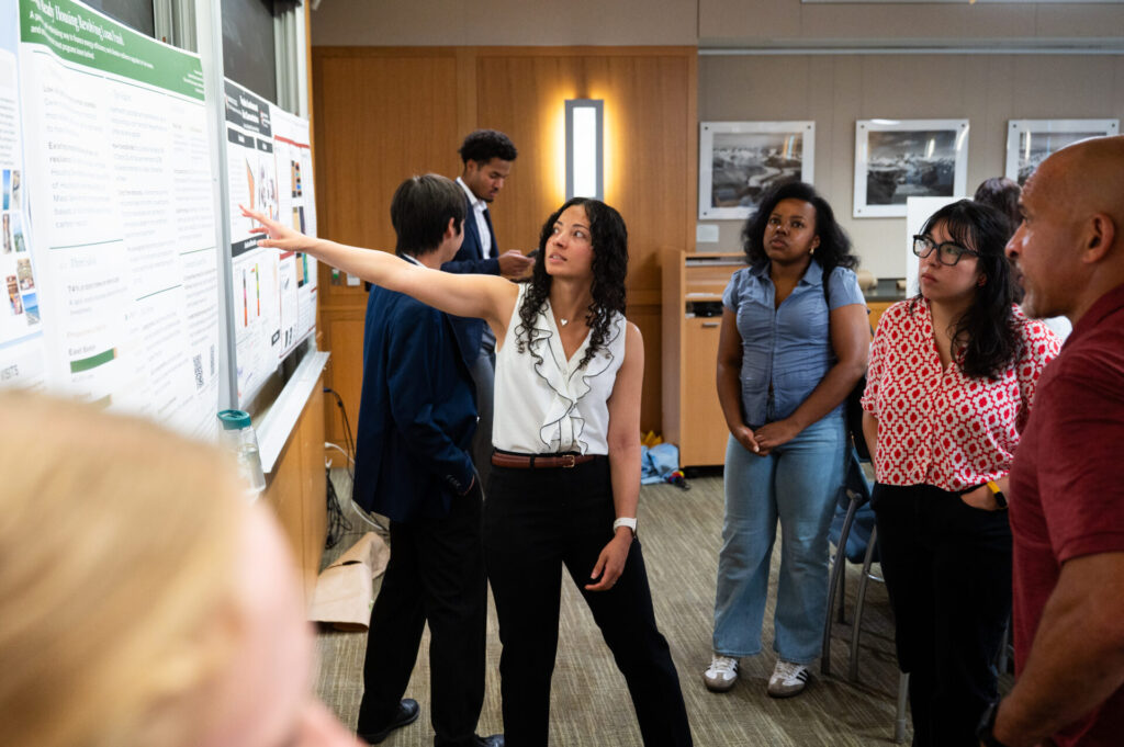 Student presents research poster at Salata Institute summer research funding program event